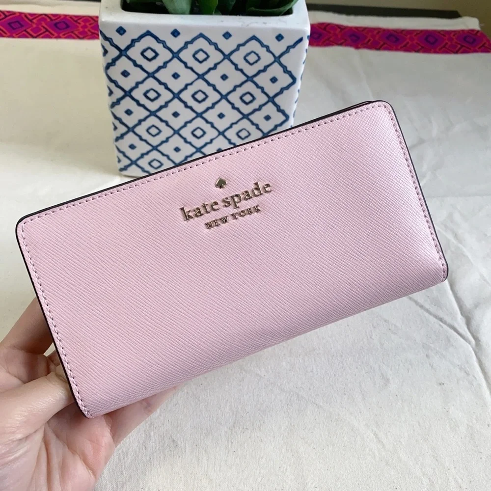 Kate Spade staci large slim bifold wallet in chalk pink